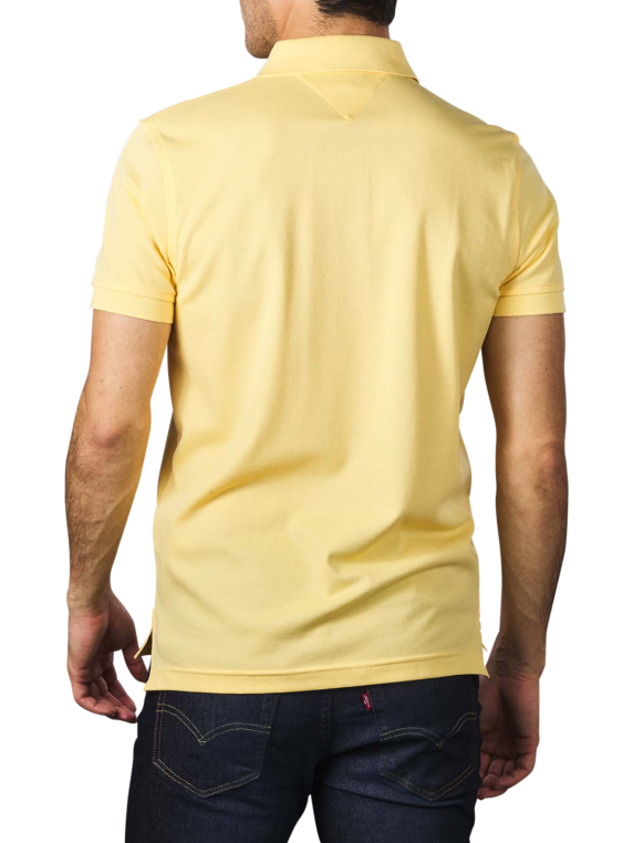 yellow collared shirt